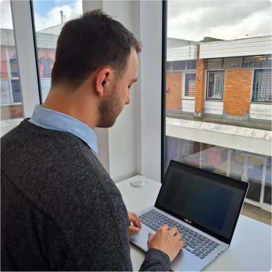 shan on his laptop working photo